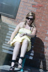 Upskirt - cute blonde in yellow dress